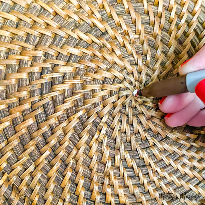 Use a sharpie to disguise nail on basket wall 