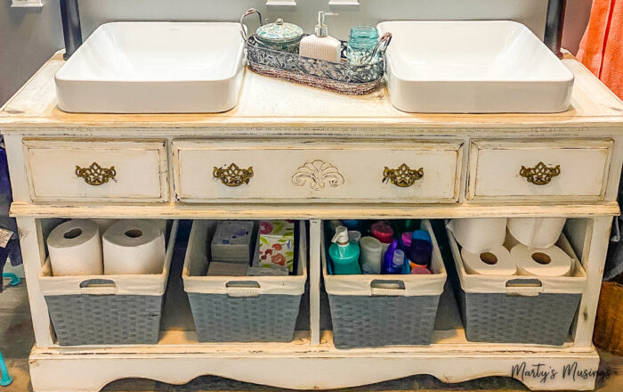 Chalk painted dresser turned into a vanity in bathroom
