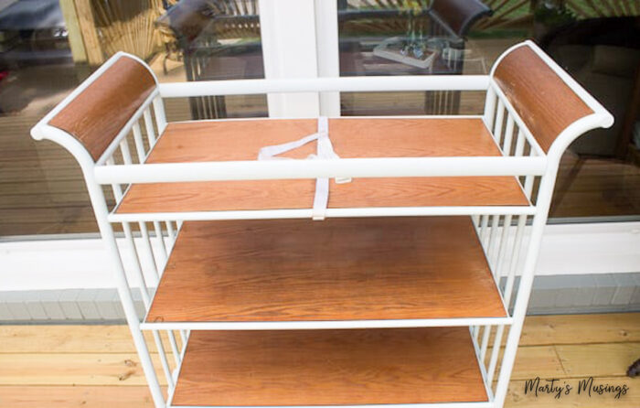 Brown and white changing table