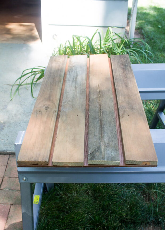 Wood slats on top of saw horses