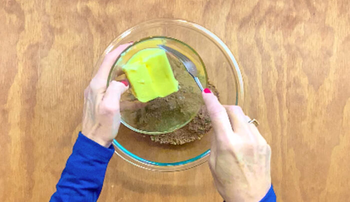 Pour butter into glass bowl