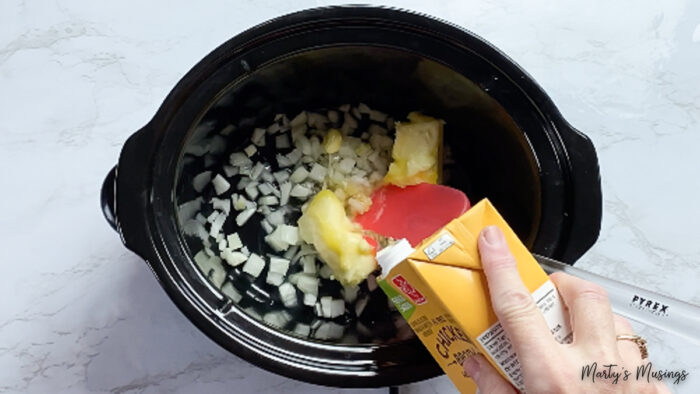 Pour chicken stock into crock pot