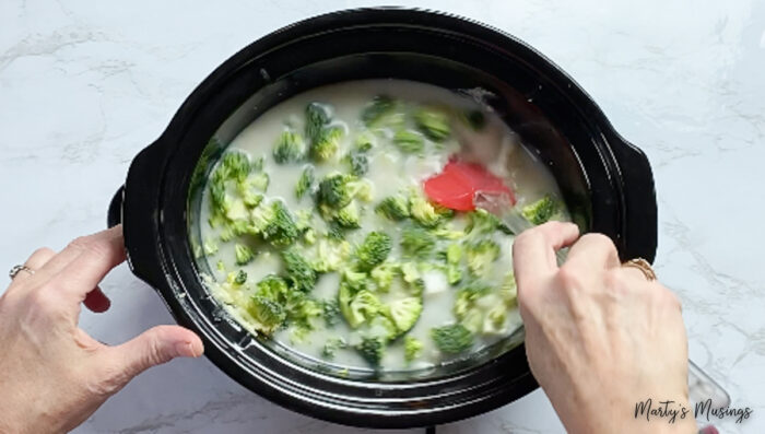 Stir all ingredients for broccoli cheese soup in slow cooker