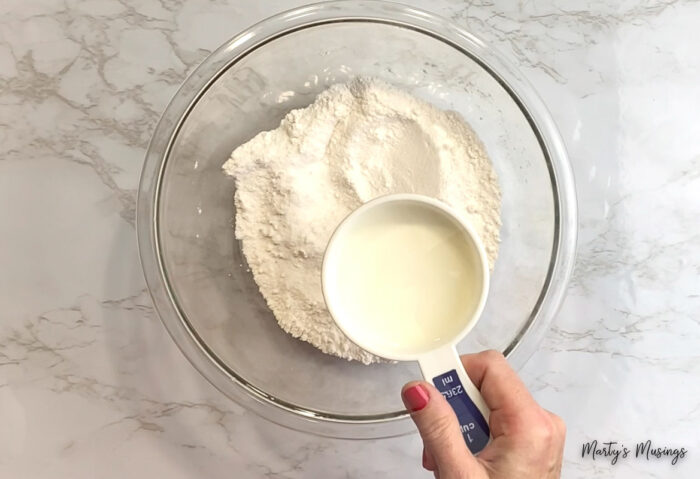 Add milk to flour mixture