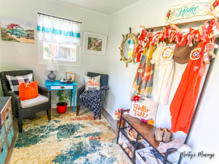 Sunroom decorated for fall