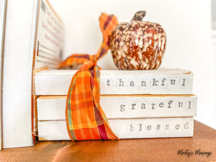 Stamped books with tankful grateful and blessed on them