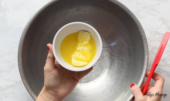 Melted butter in white dish