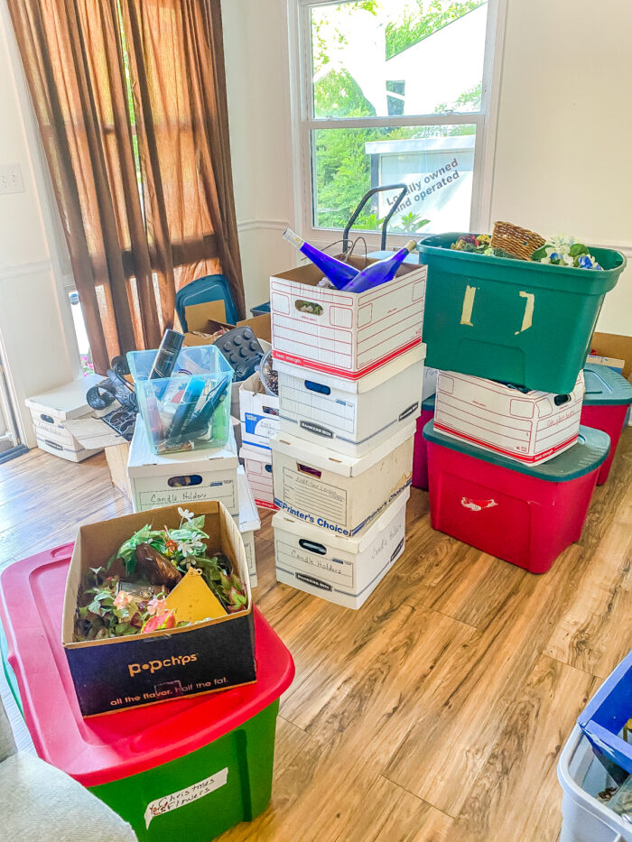 Boxes of stuff piled in living room