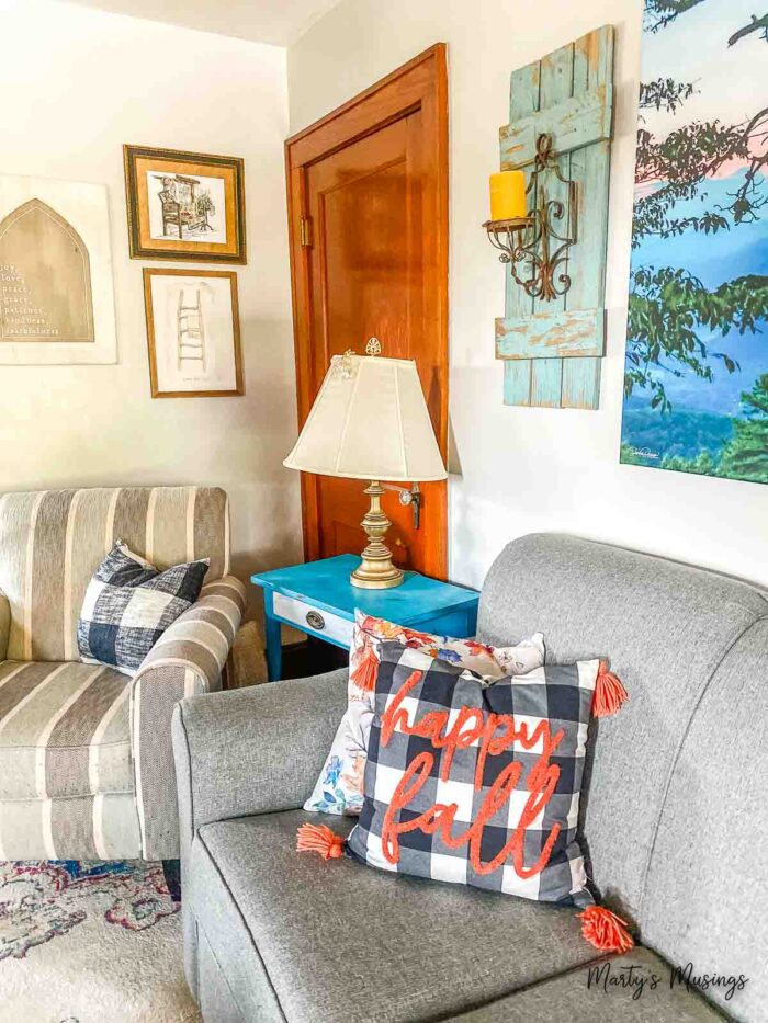 Cozy corner decorated for fall with pillows